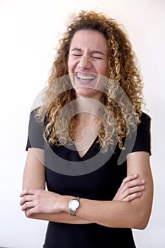 Young girl laughing out loud