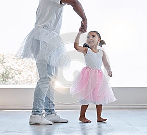 Young girl, learning ballet with dad or teacher for fitness, fun and health at house. Female child dancer in costume