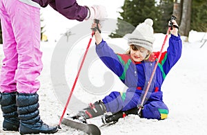 Young girl learning to ski