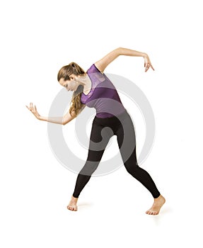 Young girl with long hair dancing modern ballet.
