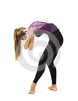 Young girl with long hair dancing modern ballet.