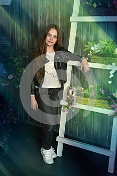 Young girl with long hair and flowers