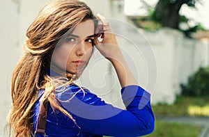 Young girl looking back over her shoulder