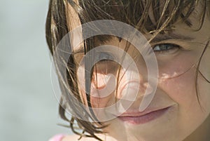 A young girl looking at camera