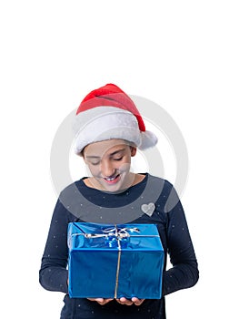 Young girl looking at a christmas present