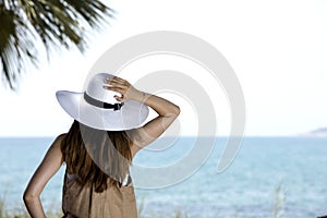 Young girl looking the horizon