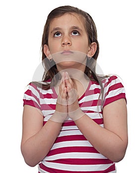 Young girl looking up and praying