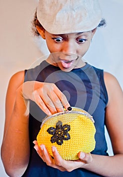 Young girl looks happy inside her handkerchief in knitted cotton