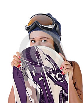 Young girl looks out for snowboard