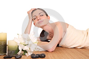 Young girl lying in a spa