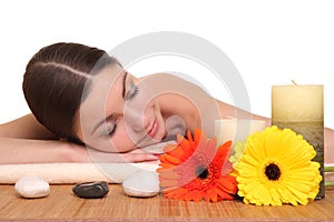 Young girl lying in a spa