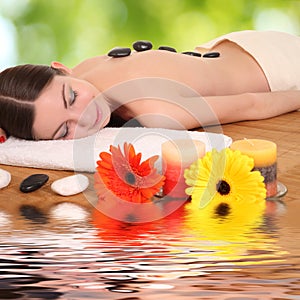 Young girl lying in a spa
