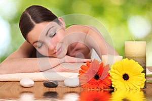 Young girl lying in a spa