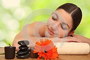 Young girl lying in a spa