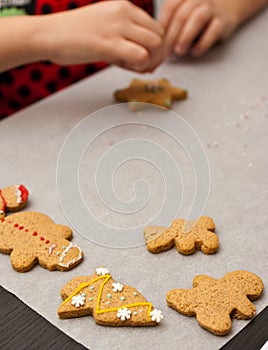 Young girl making gingerbread Christmas cookies