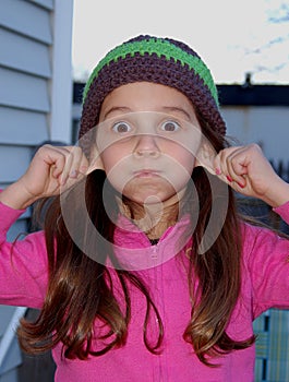 Young girl making goofy face