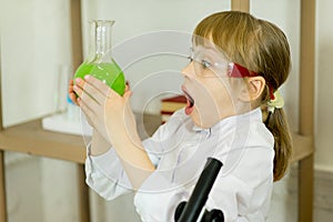 Young girl making science experiments