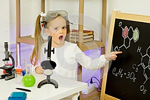 Young girl making science experiments