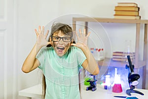 Young girl making science experiments