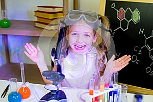 Young girl making science experiments