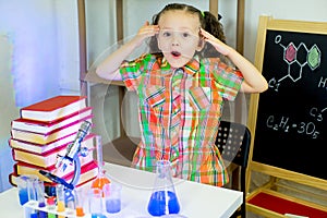 Young girl making science experiments