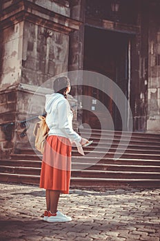 Young girl with map on a sightseen tour