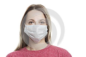 Young girl in a medical mask. Precautions during the period of the coronavirus pandemic. Prevention of allergic reactions.