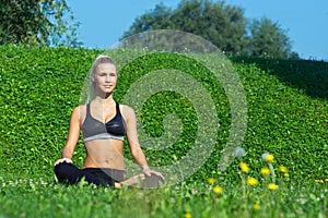 Young girl meditate in yoga position