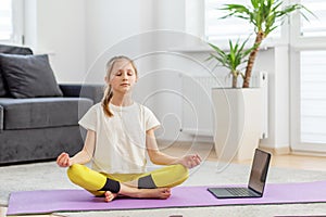 Young Girl Meditating During Online Class