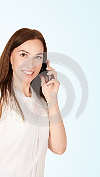 Young girl with mobilephone. Business woman talking on phone. Adorable caucasian businesswoman shopping