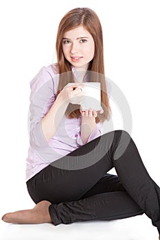 Young girl with mug with coffee