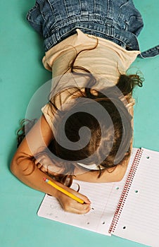 Young girl with notebook