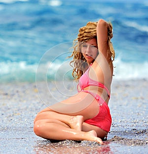 Young girl on the ocean coast