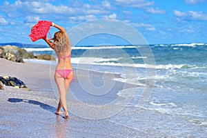 Young girl on the ocean coast