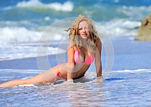 Young girl on the ocean coast