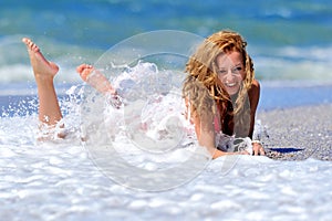 Young girl on the ocean coast