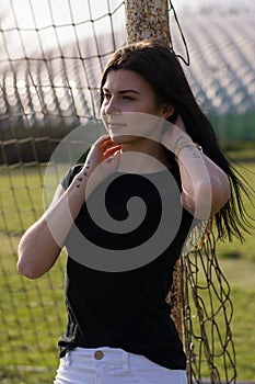 Young girl in old fotball stadium