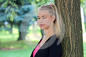 Young girl outside relaxing