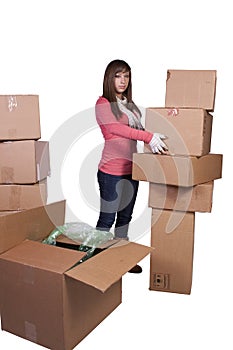 Young girl packing up and moving - isolated