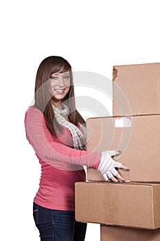 Young girl packing up and moving - isolated