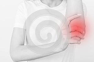 Young girl with pain in elbow, joint inflammation isolated on white background