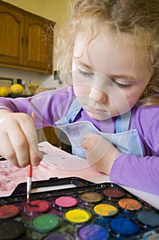 Young girl painting