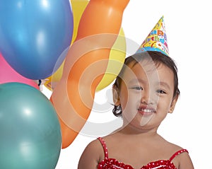 Young girl with party hat