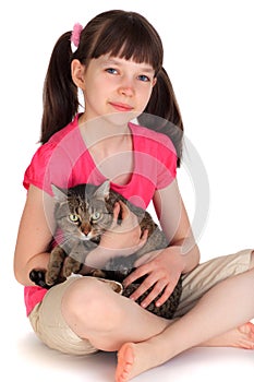 Young girl with pet cat