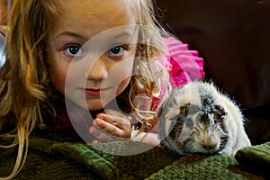 Young Girl with Pet Guinea Pig