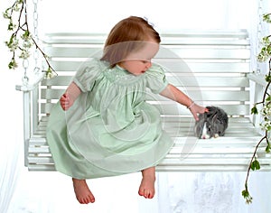 Young Girl Petting Bunny