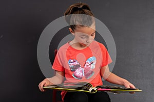 Young Girl with Photo Book Journal