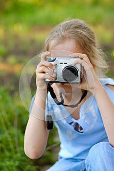 Young girl, photographer