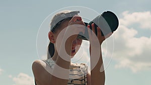 Young girl photographer shooting nature