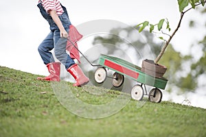 Young girl planting tree in park eco-aware